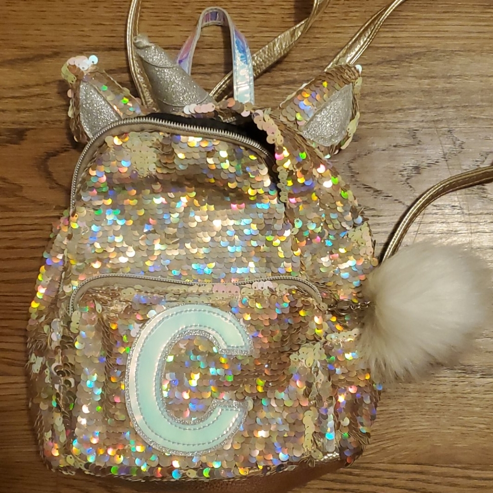 Cute backpack with a c on it